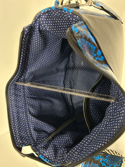 Blue and black snakeskin bag