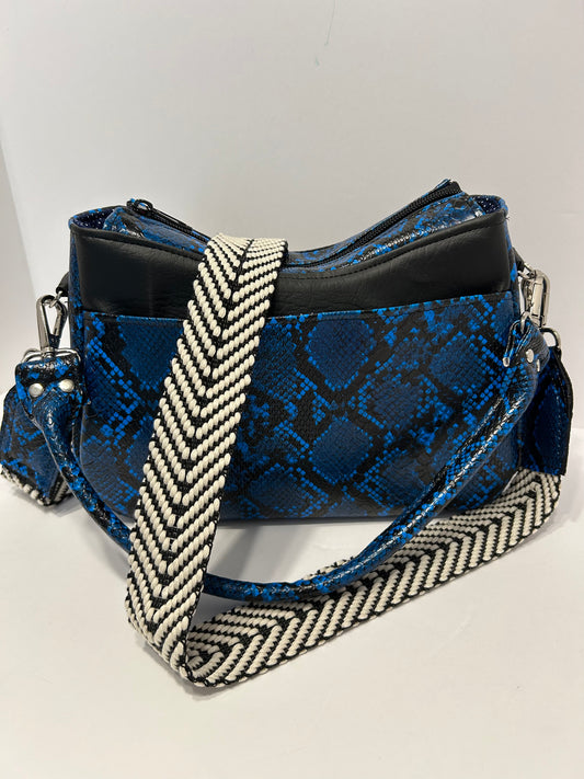 Blue and black snakeskin bag