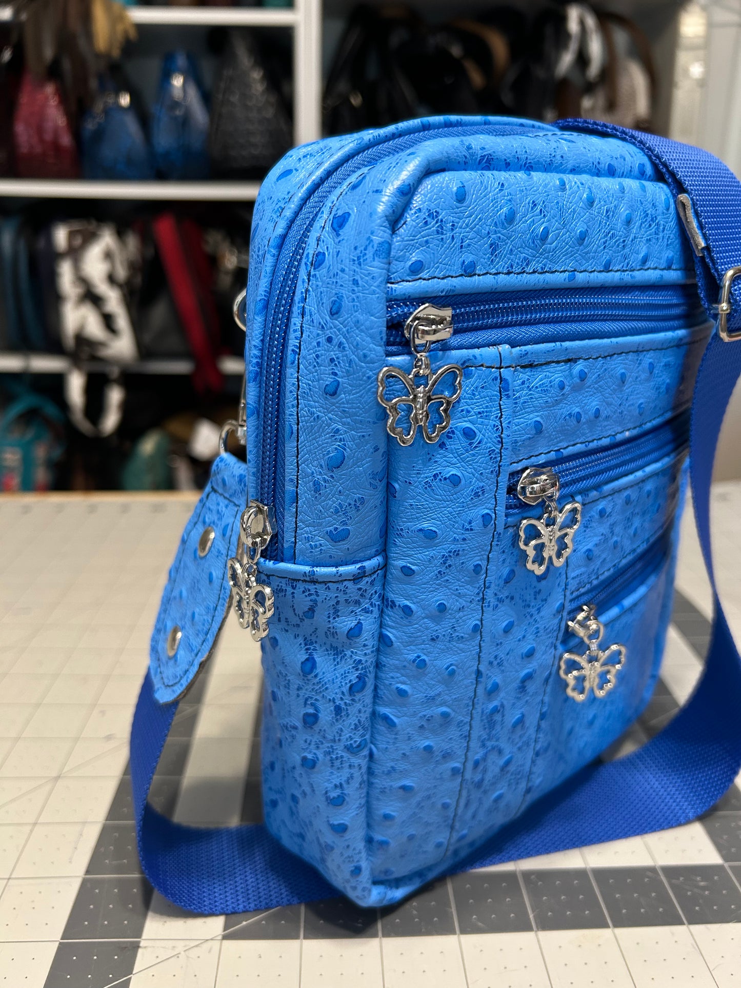 Blue Ostrich embossed leather Bartleby Bag